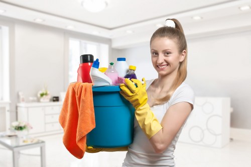 Technician performing carpet stain treatment